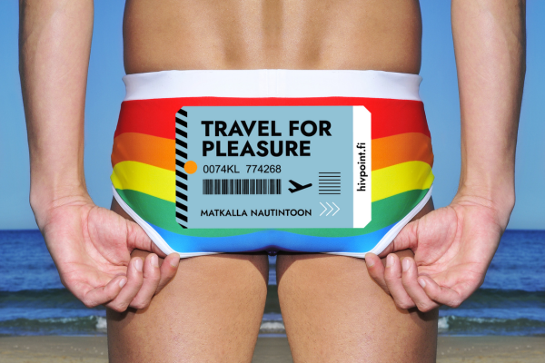 A man with rainbow coloured swimpants from behind. Travel for Pleasure logo in front of the pants.