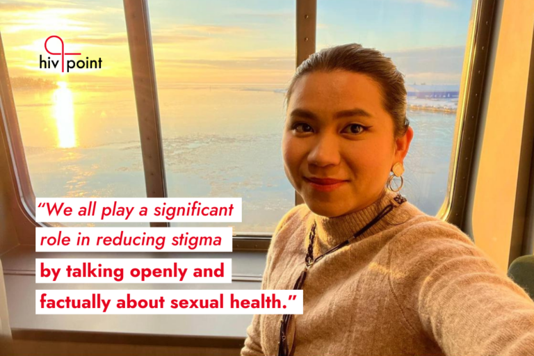 Hivpoint's Health Buddy Jennie is smiling to the camera. The selfie is taken on a cruise ship and the sun is setting over the sea behind Jennie. On top of the pic, there's a quote from Jennie: "We all play a significant role in reducing stigma by talking openly and factually about sexual health."