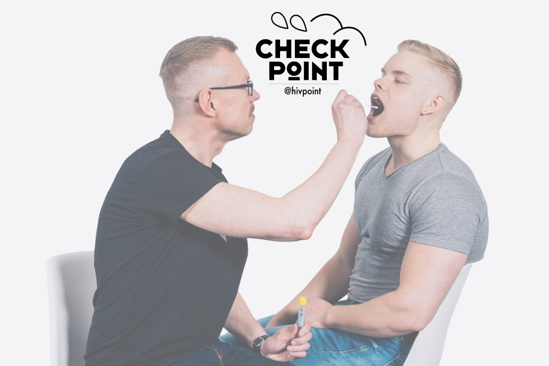 A Hivpoint employee takes a swab sample from another person's throat.