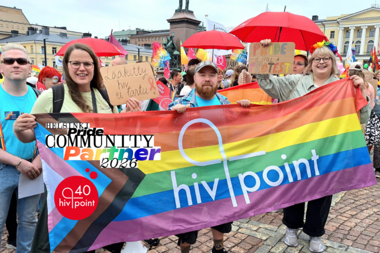 Hivpoint employees hold the Pride flag at the Helsinki Pride parade 2025.